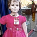 Doll with a price tag - photo taken by a trafficked woman